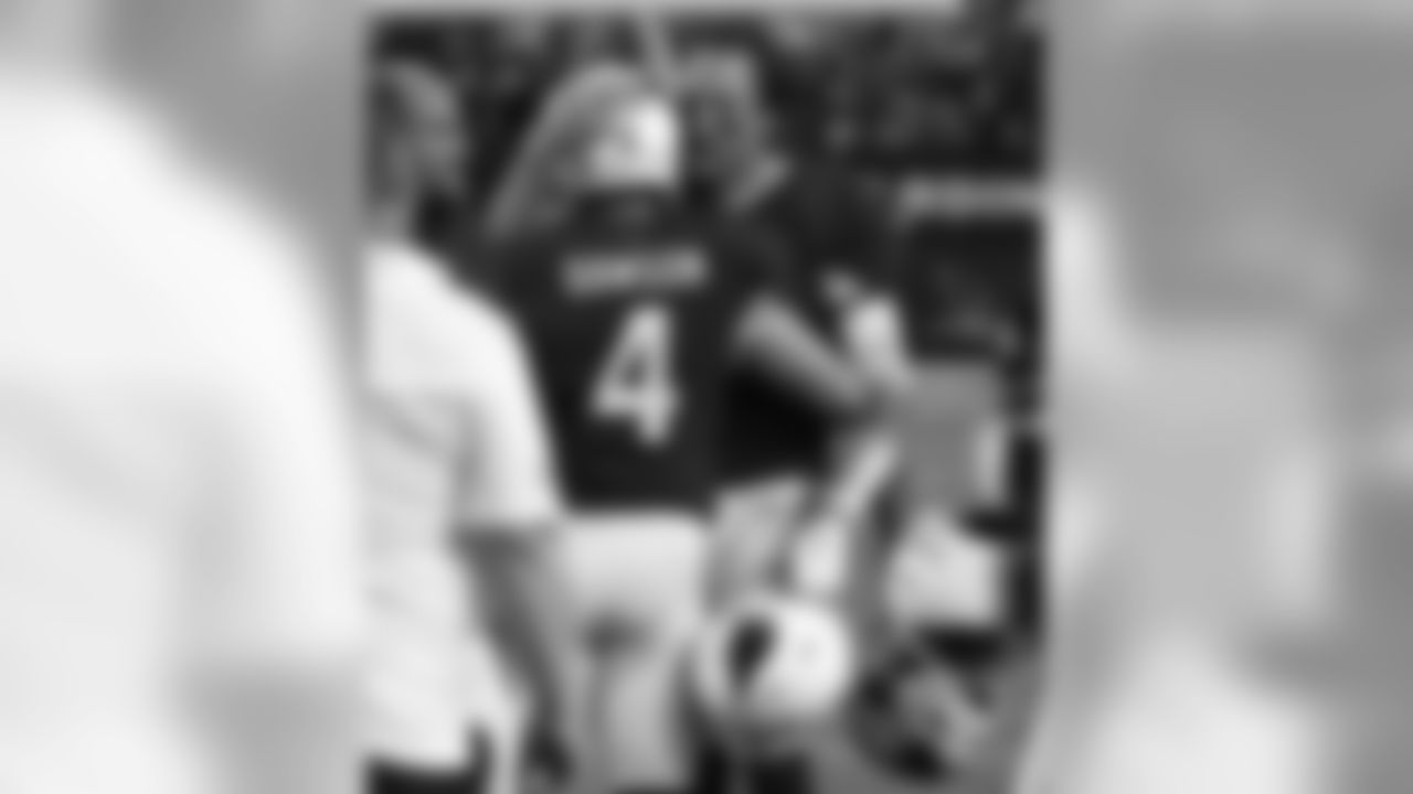 Blaine Gabbert congratulates Phil Dawson after making the field goal