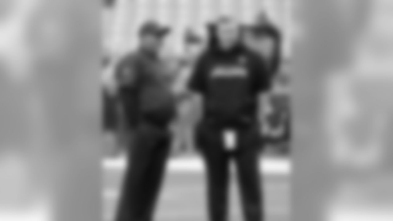 Coach Bruce Arians (left) and Jaguars coach Doug Marrone