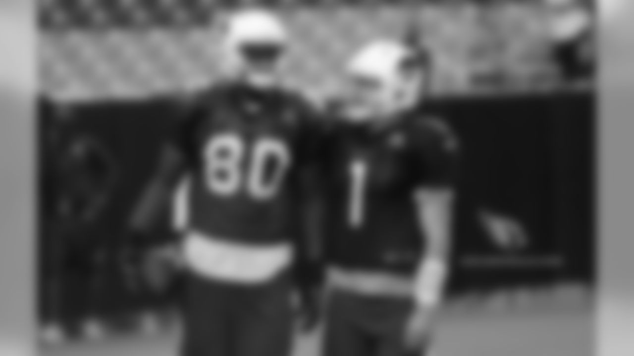 QB Trevor Knigt (right) chats with TE Ifeanyi Momah after Momah's fourth-down TD catch