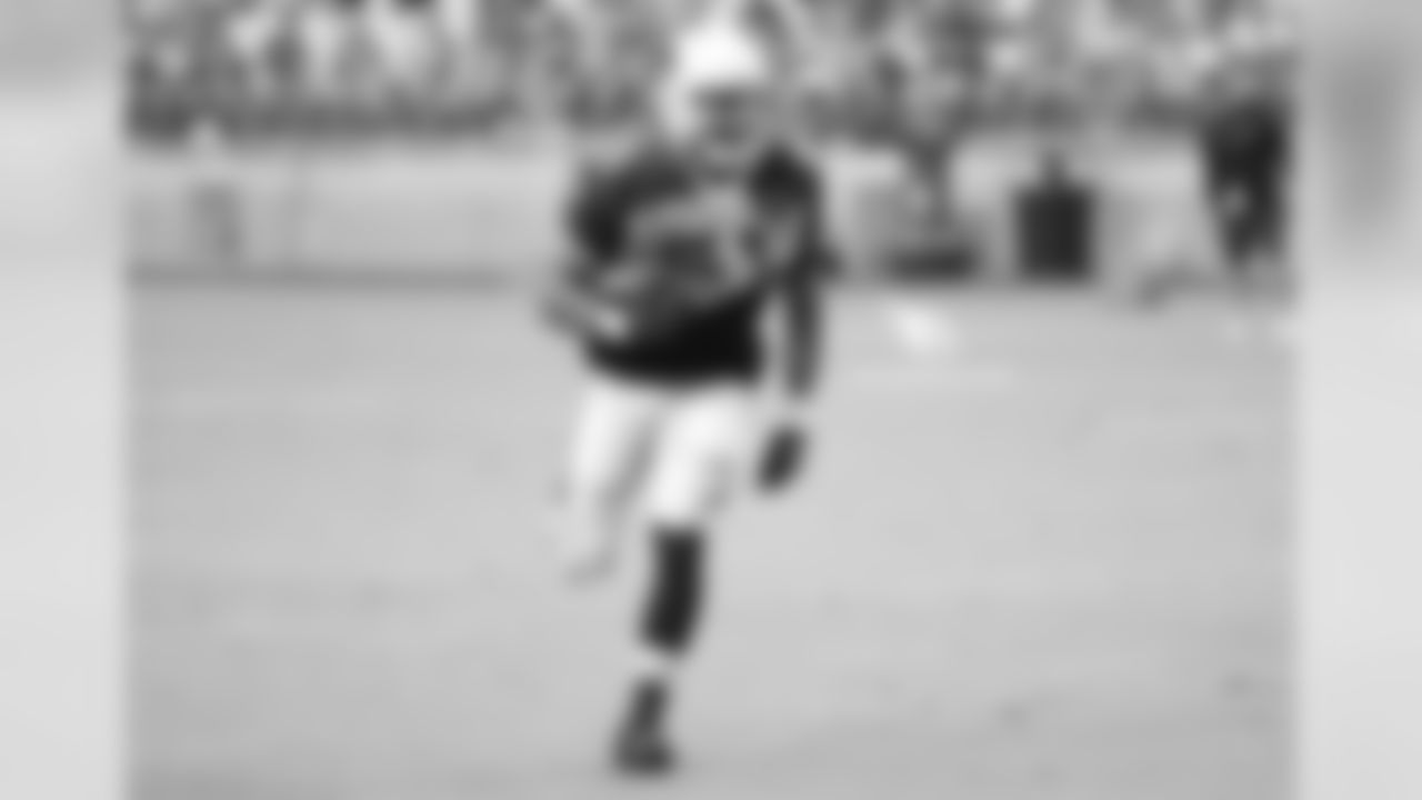 LB Tre'Von Johnson returns an interception