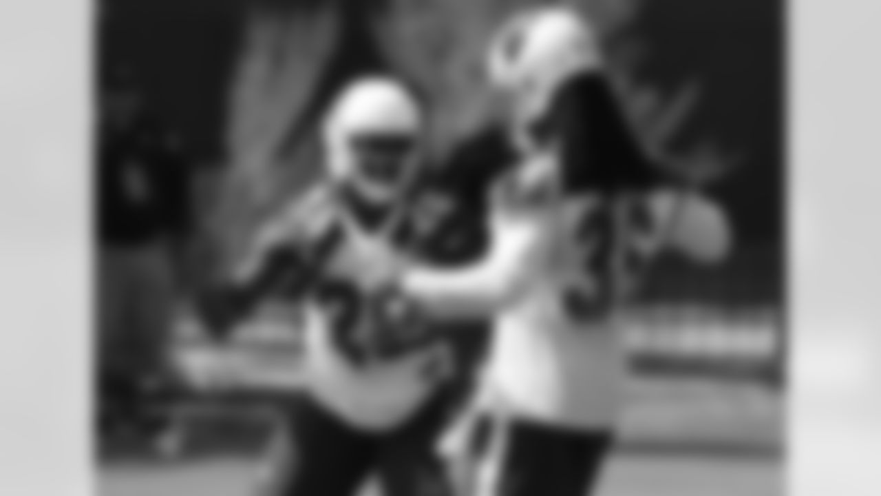 CB Brandon Williams gets congratulations from S D.J. Swearinger after breaking up a pass