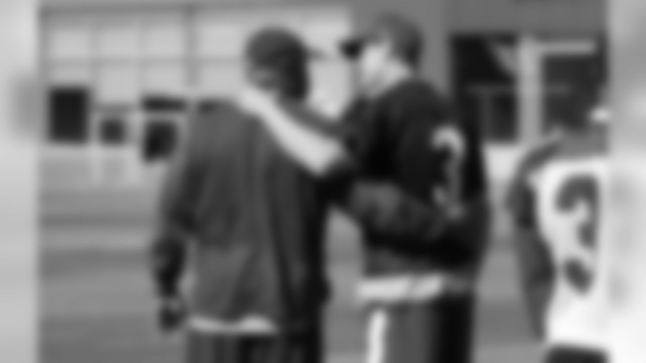 OC Harold Goodwin (left) with QB Carson Palmer