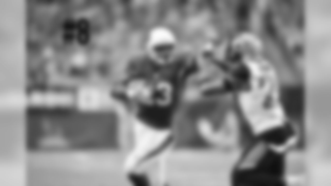 RB Adrian Peterson attempts to stiff-arm Jaguars CB Jalen Ramsey