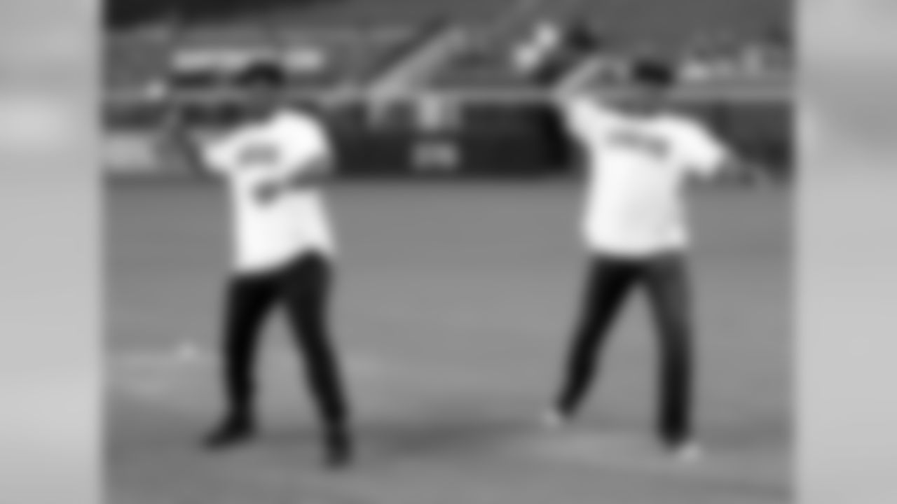 David Johnson and Michael Floyd throw the first pitch before the Diamondbacks game