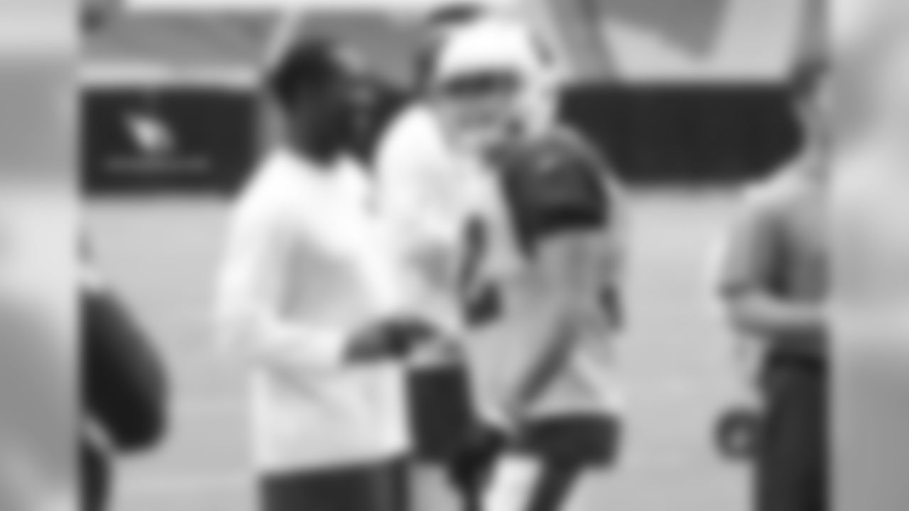 S Tyrann Mathieu shakes hands with assistant special teams coach Anthony Blevins after breaking up a screen play
