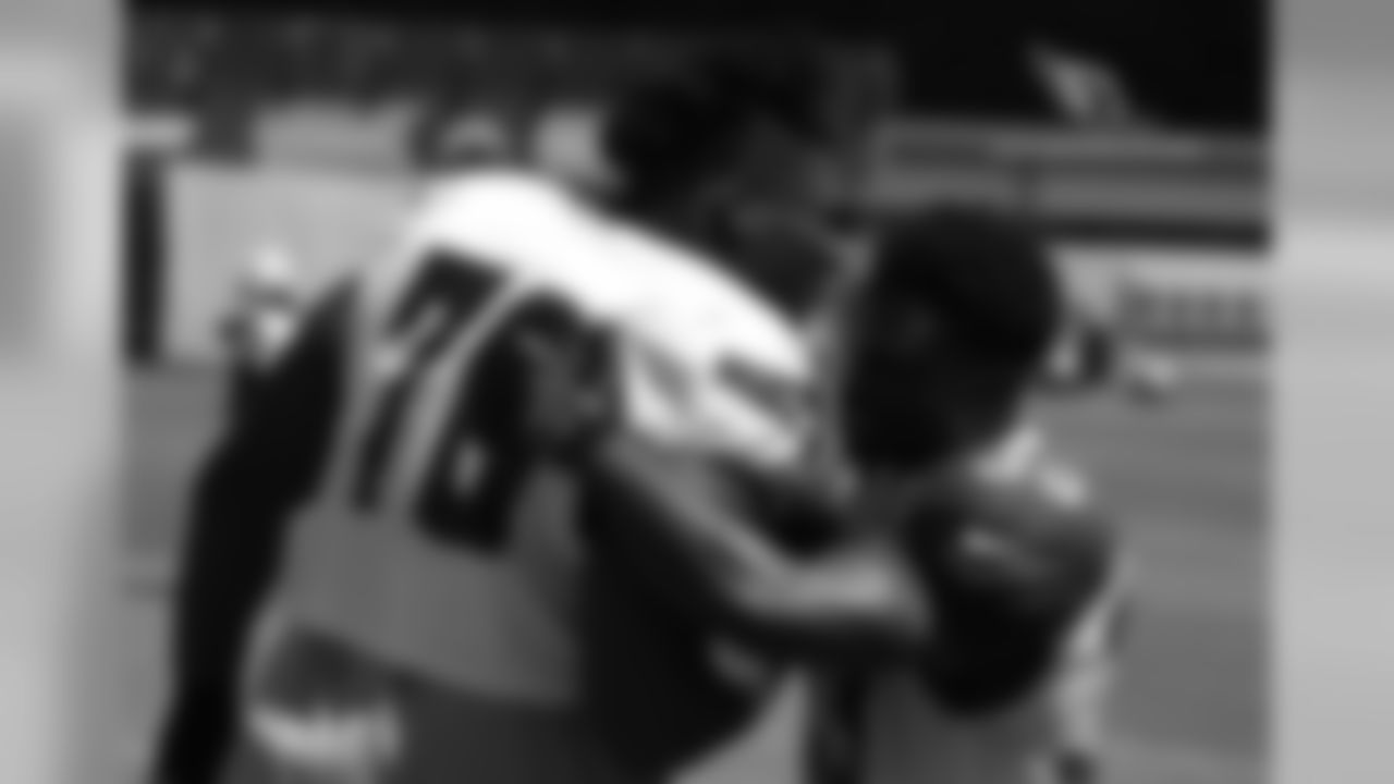 RB Kerwynn Williams says hi to Chargers T D.J. Fluker
