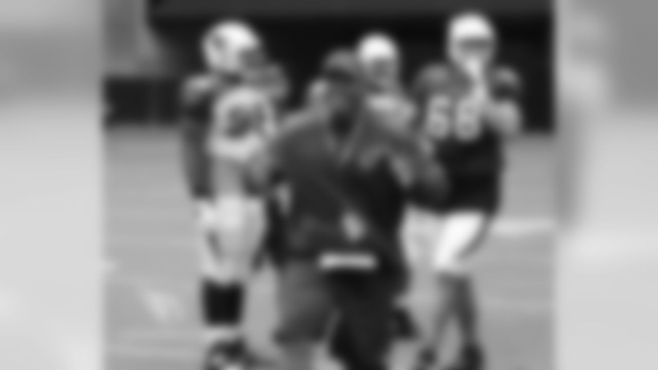 OC Harold Goodwin is happy after his linemen execute a block