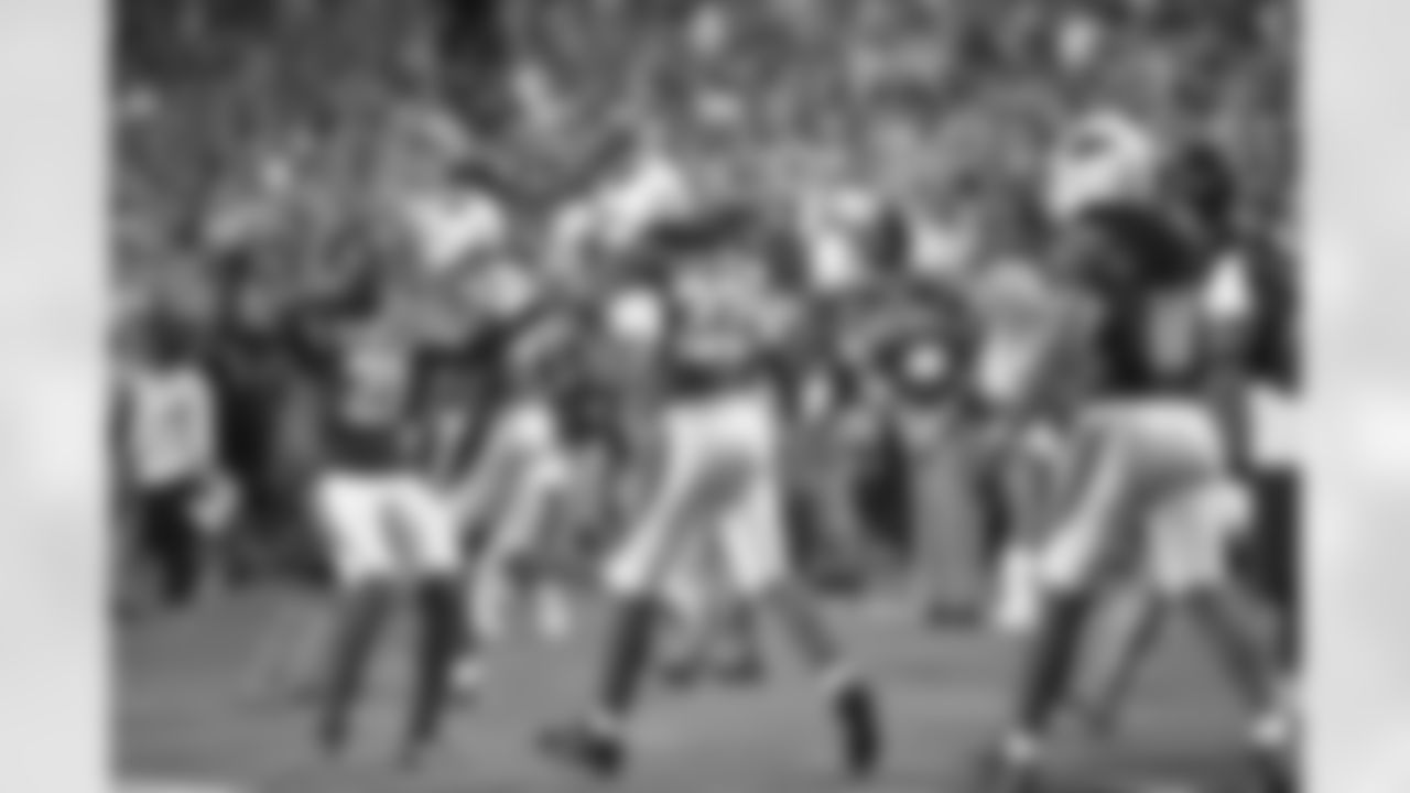 CB Patrick Peterson (left) congratulates RB Chris Johnson