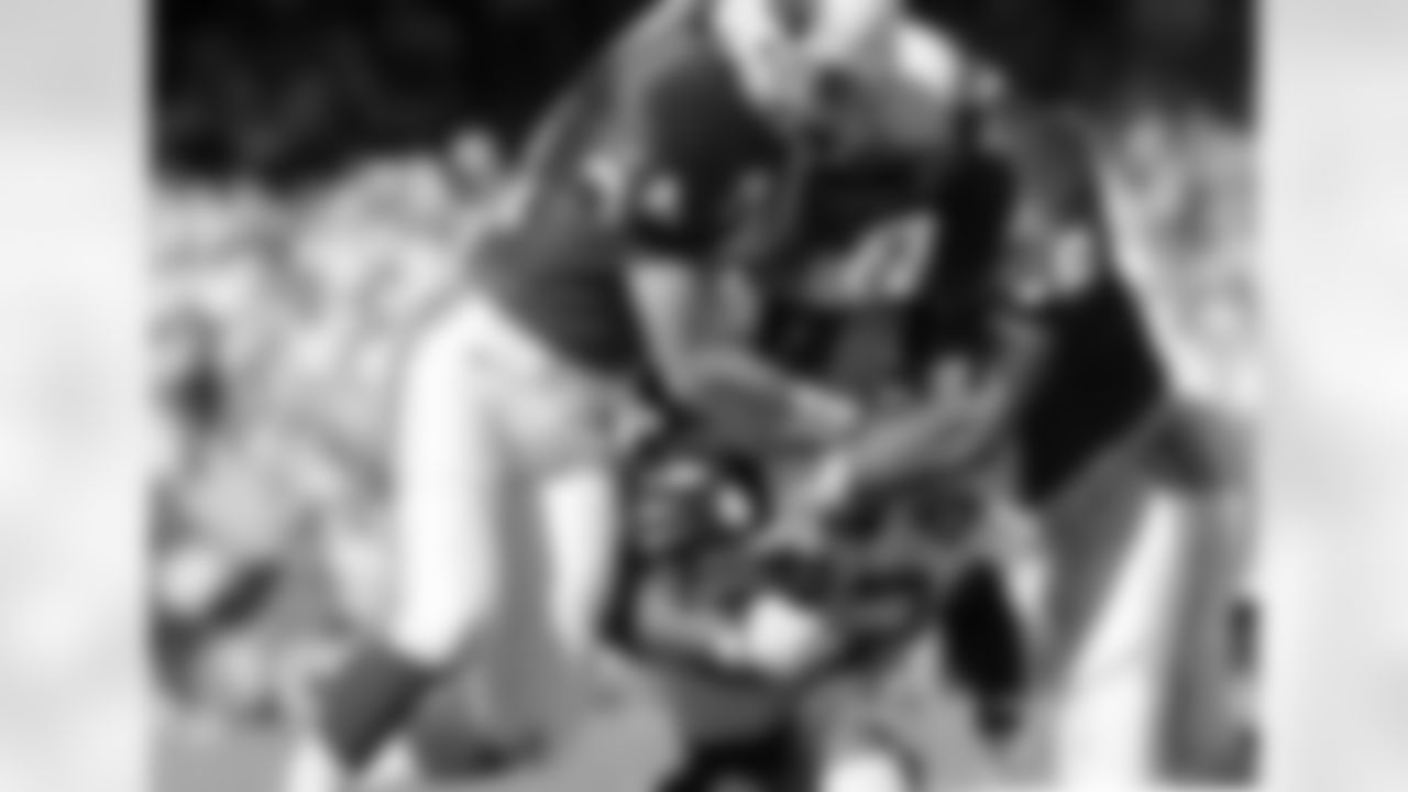 1994: S Terry Hoage and LB Eric Hill converge on Washington RB Ricky Ervins