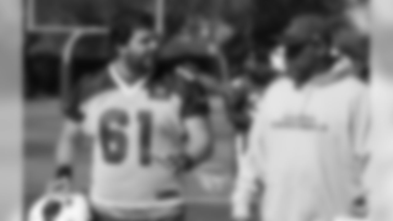 OL Cole Toner asks for help from OC Harold Goodwin