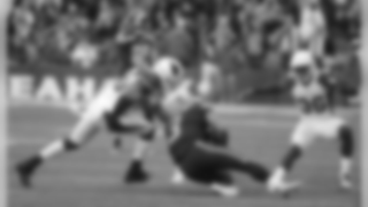 Seahawks QB Russell Wilson slides