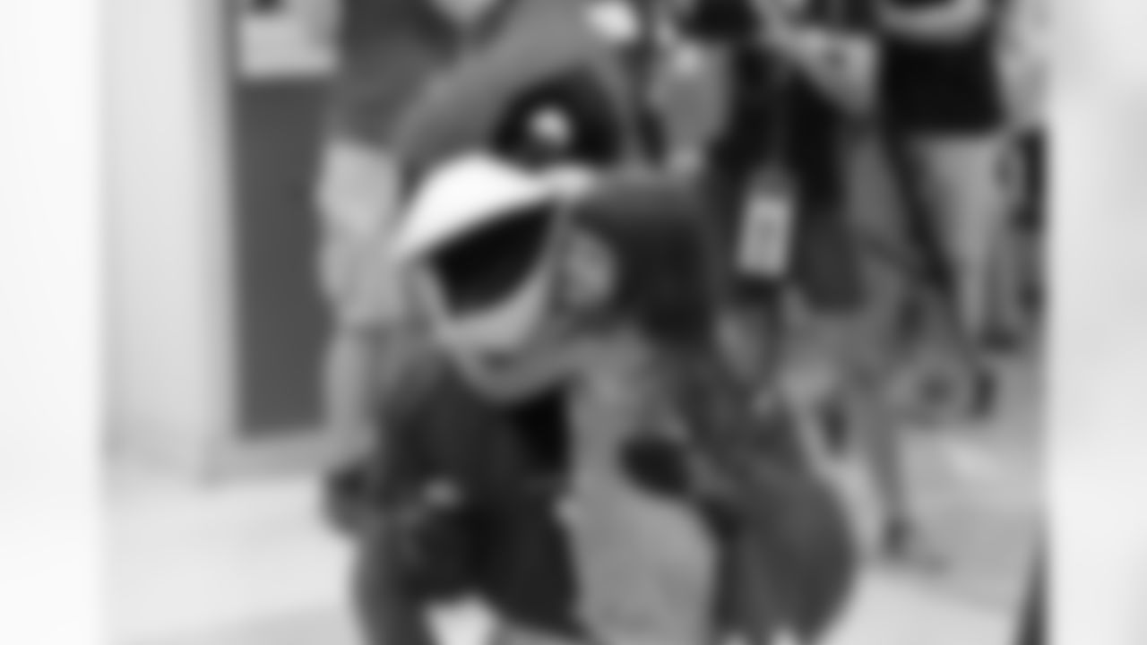Big Red hugging a young fan