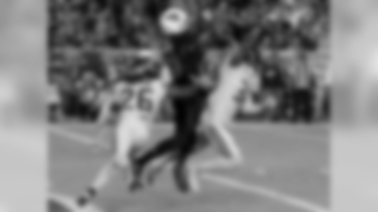 WR Jaron Brown goes up for the catch