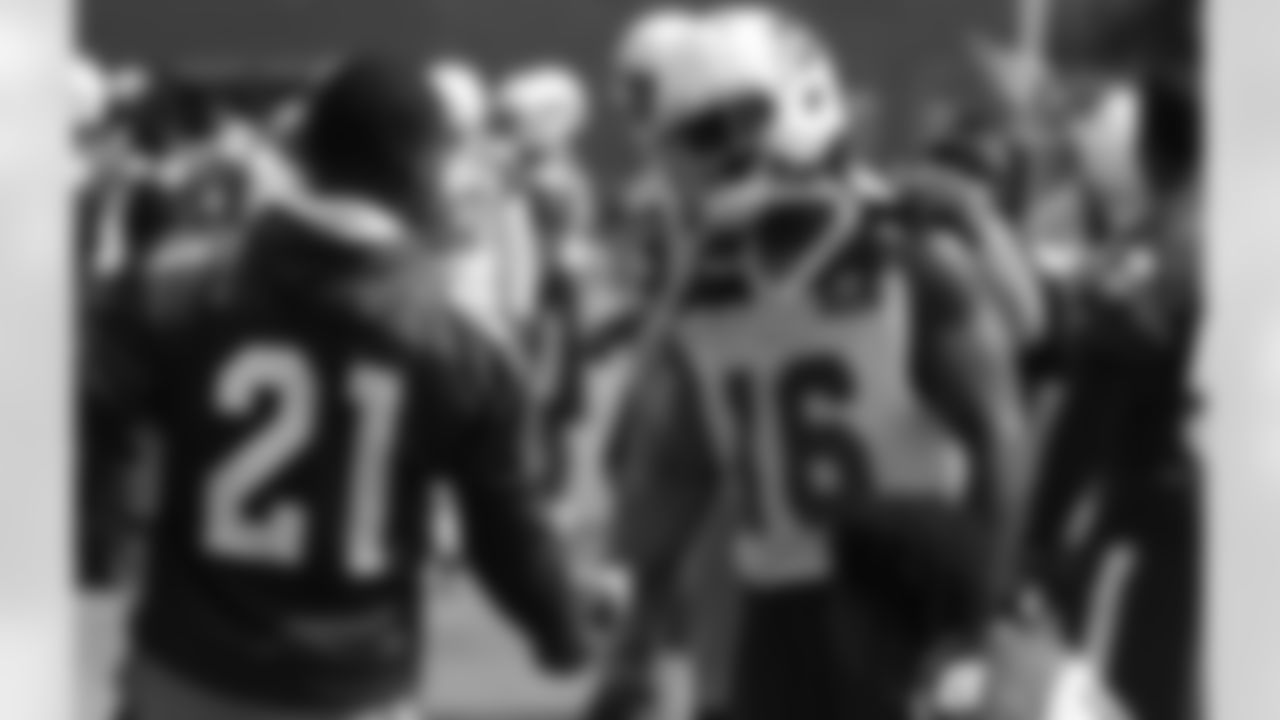 CB Patrick Peterson shakes hands with WR Chad Williams