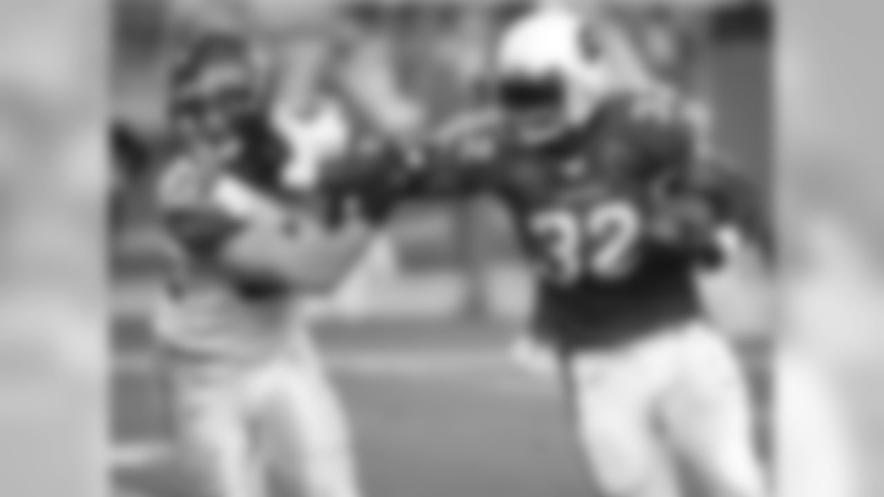 2008: RB Edgerrin James stiff-arms Seattle's Will Herring
