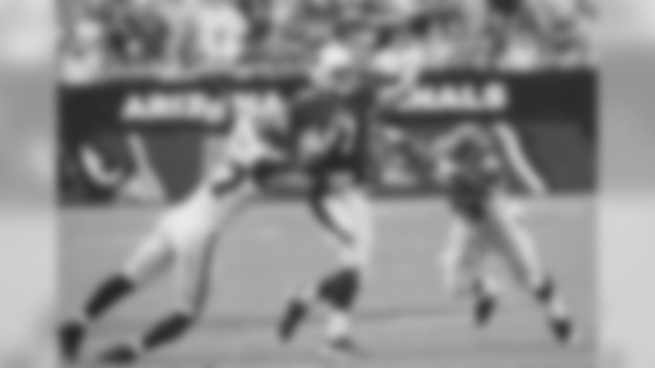 2007: QB Matt Leinart is pressured by Seattle's Patrick Kerney and Darryl Tapp