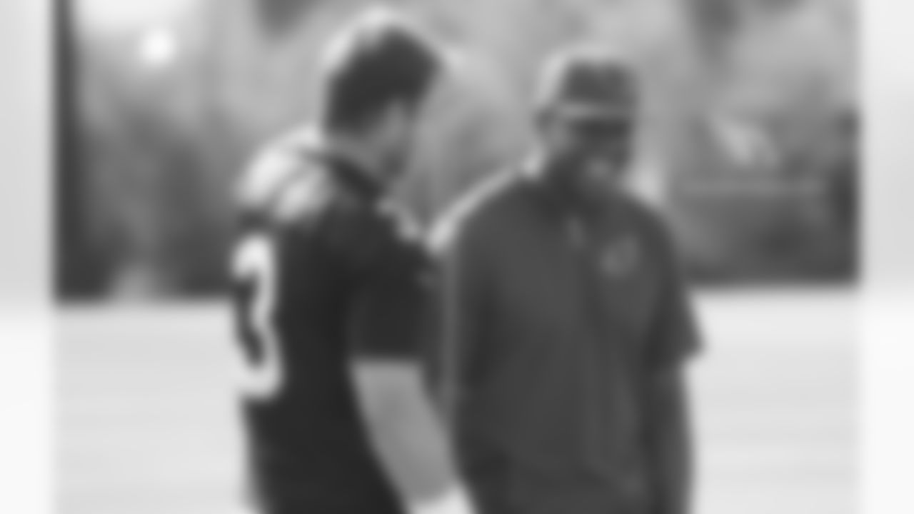 QB Carson Palmer (left) and QB coach Byron Leftwich