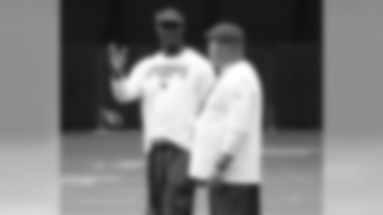 Coaching intern Plaxico Burress and coach Bruce Arians