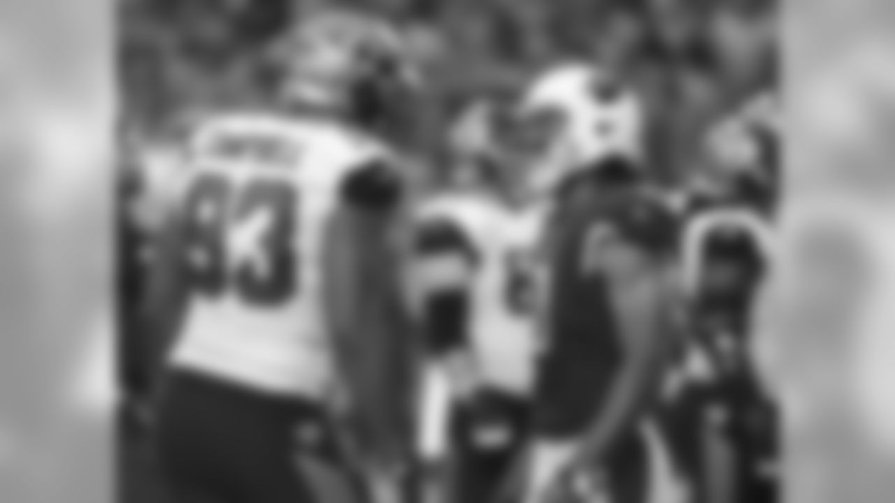 Jaguars DE Calais Campbell (left) and Cardinals WR Larry Fitzgerald (right)