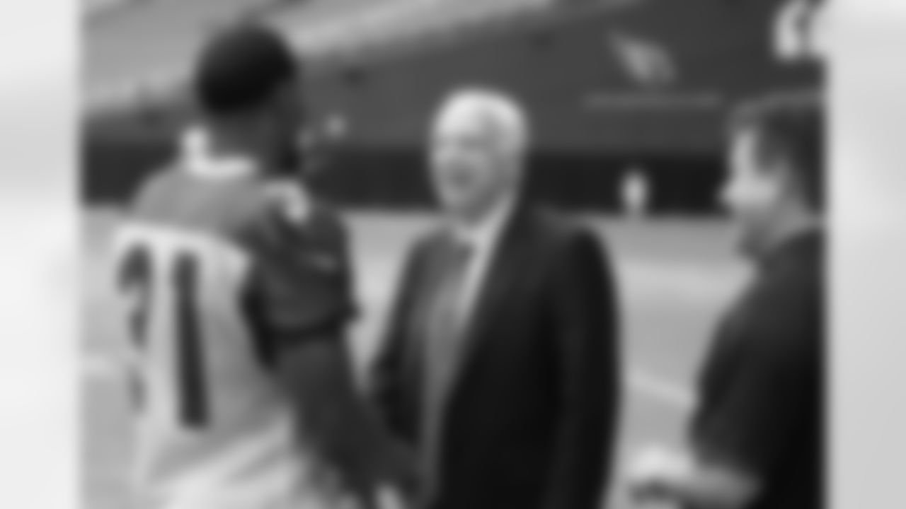 Senator John McCain and RB David Johnson