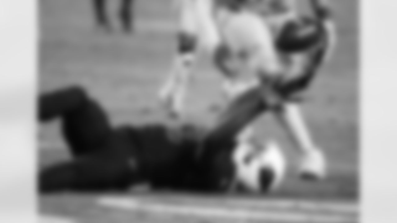 WR Jaron Brown bobbles the ball