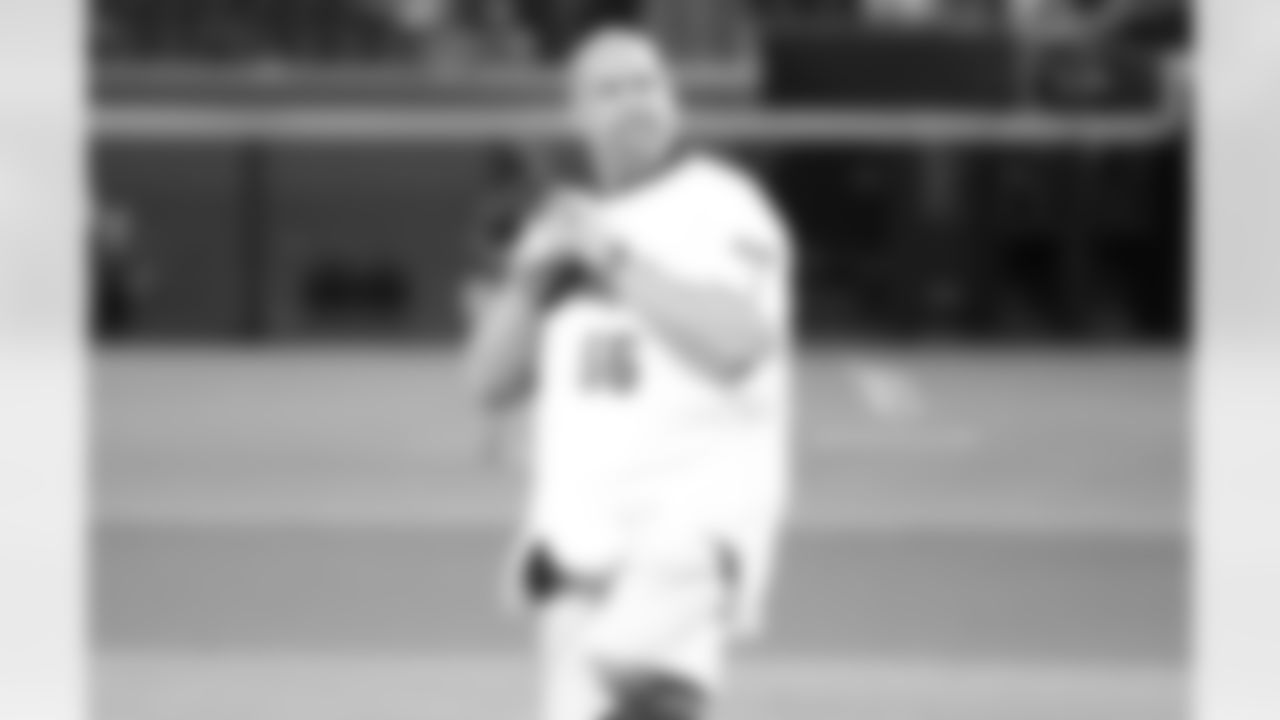 Steve Keim prepares to throw the first pitch