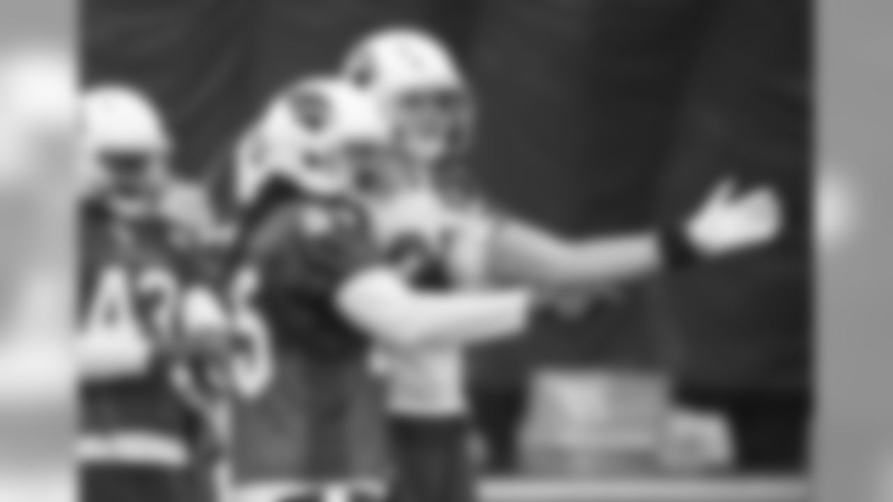 LB Josh Bynes and TE Troy Niklas