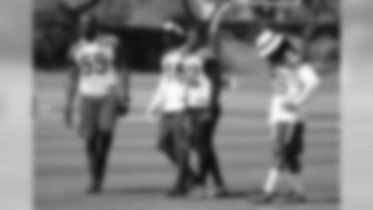 Chandler Jones, Markus Golden, Tony Jefferson and D.J. Swearinger watch the walkthrough