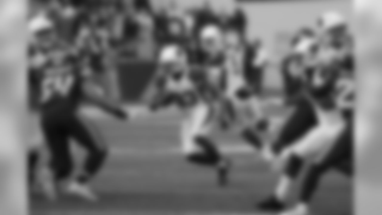 RB Kerwynn Williams looks for running room