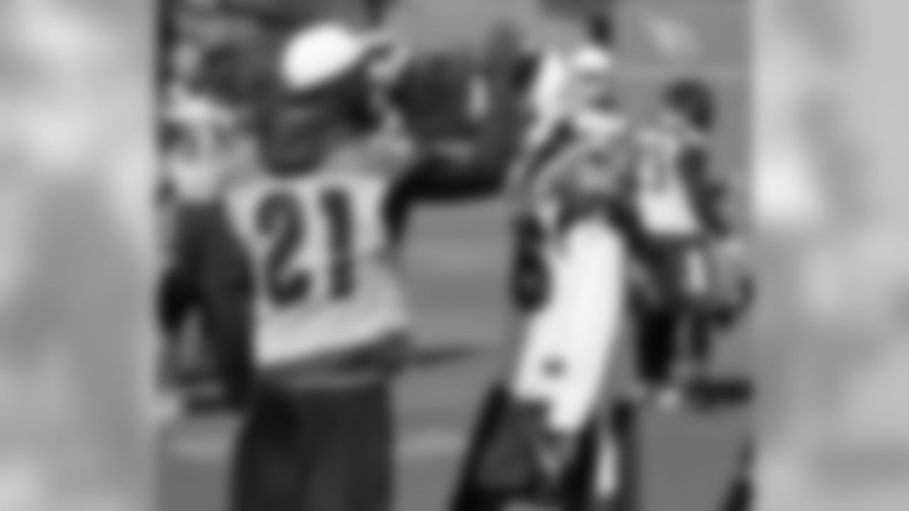 CB Patrick Peterson gives advice -- and a pat on the head -- to CB Brandon Williams
