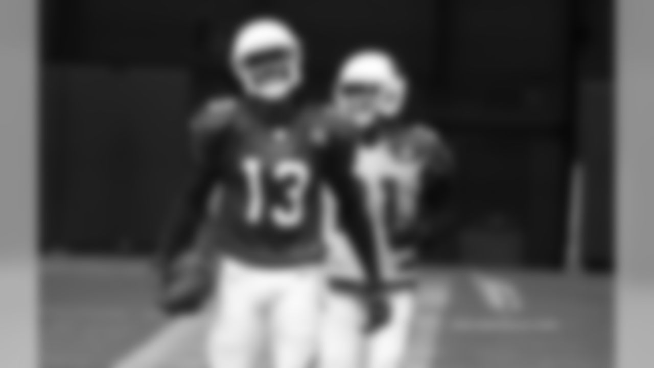 WR Jaron Brown and CB Patrick Peterson have a chuckle