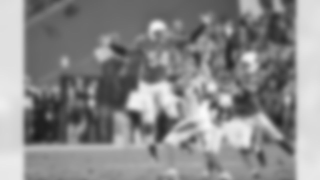LB Dwight Freeney (left) and LB Kevin Minter pressure Bengals QB Andy Dalton