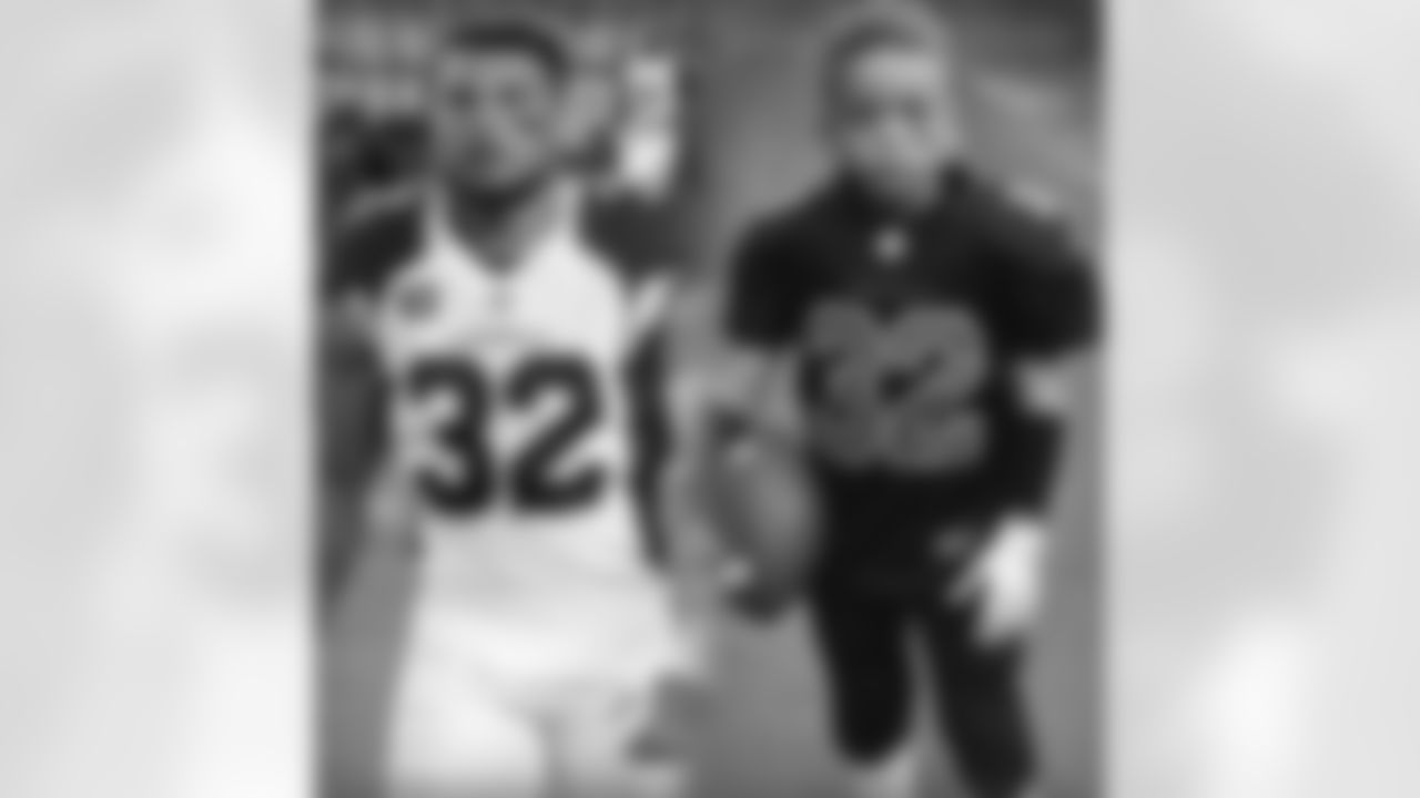 @lisabb37 shows off mini Tyrann Mathieu