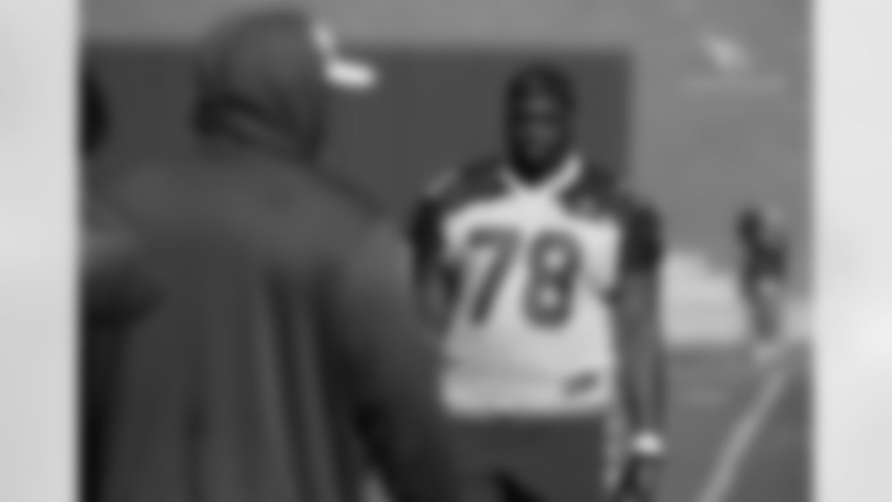 T Givens Price listens to OC Harold Goodwin