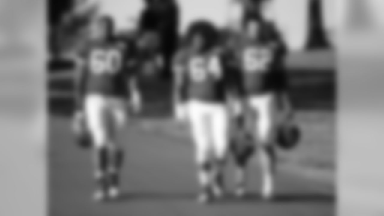 Kansas City Chiefs offensive linemen Daniel Munyer (64), Jarrod Pughsley (60), and Curtis Feigt (62) walk out to practice on the seventh day of training camp on Mosaic Life Care Field at the campus of Missouri Western State University on Saturday, August 6, 2016.