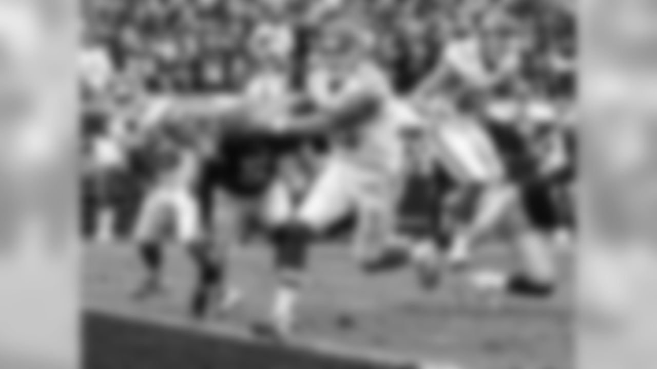 Steve Sanders' comments: "I like Alex's expression. That's what really does it for me—that determination, that feeling of accomplishment. He just got in the end zone. You can see he's cheering. He knew he was going to get into the end zone when he's running. He's hovering over the line and the ball's already crossed the plane. You can tell he's ready to celebrate. This is very unique because Alex always has such a calm demeanor to him, and to show that emotion out of him is pretty unique."