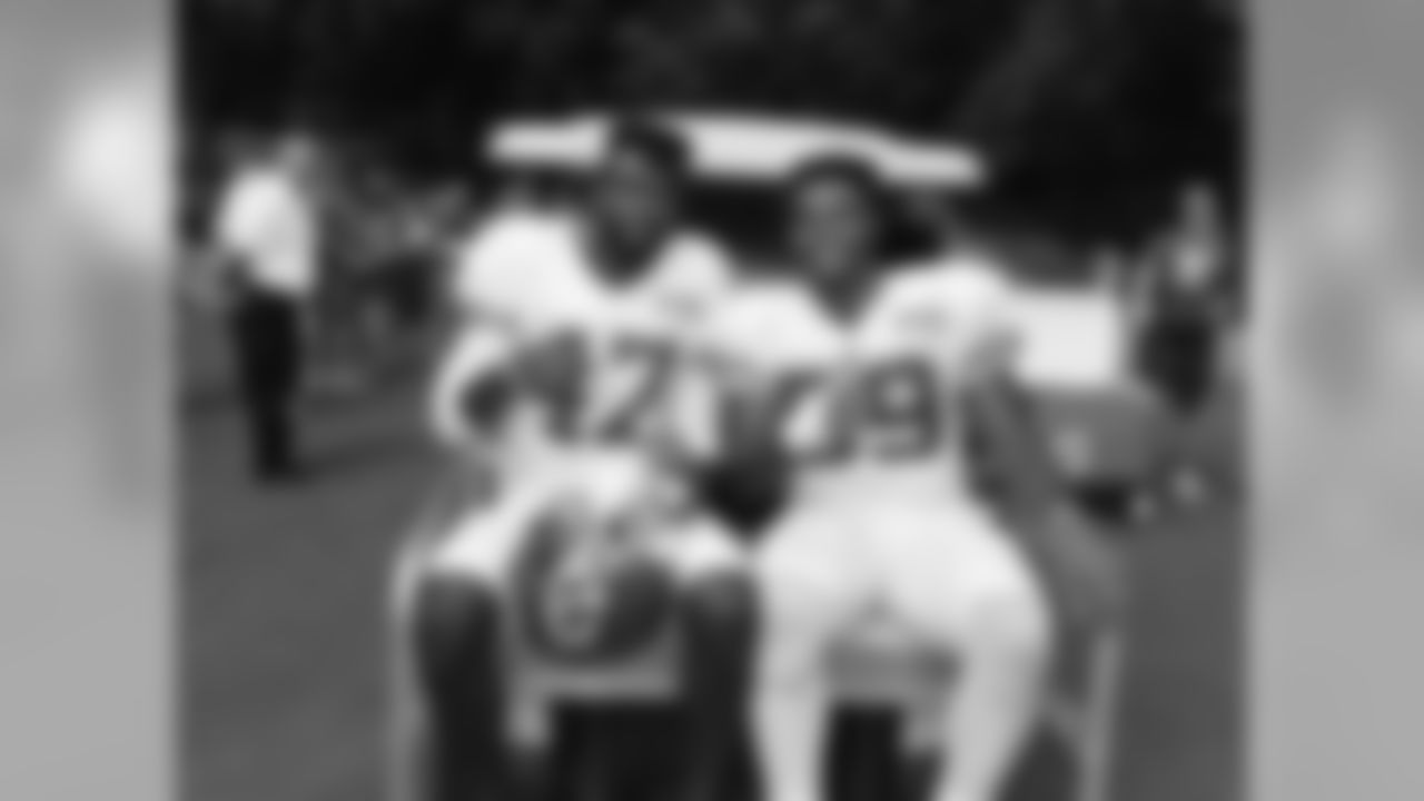 Kansas City Chiefs defensive back Shakiel Randolph (47) and linebacker Justin March (59) pose for a picture after practice on the seventh day of training camp on Mosaic Life Care Field at the campus of Missouri Western State University on Saturday, August 6, 2016.
