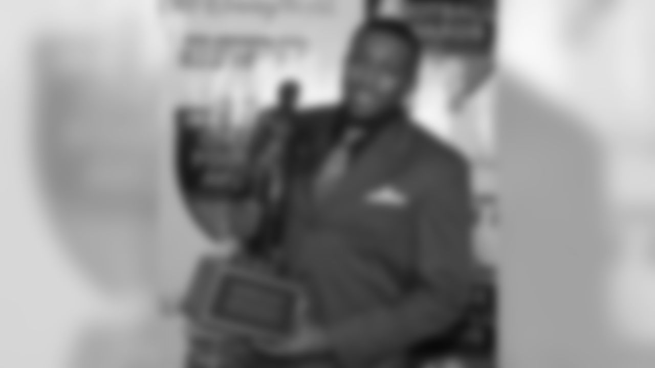 Tennessee's Eric Berry poses with his trophy after winning the Jim Thorpe Award for best defensive back at the Home Depot ESPNU College Football Awards in Lake Buena Vista , Fla., Thursday, Dec. 10, 2009. (AP Photo/John Raoux)