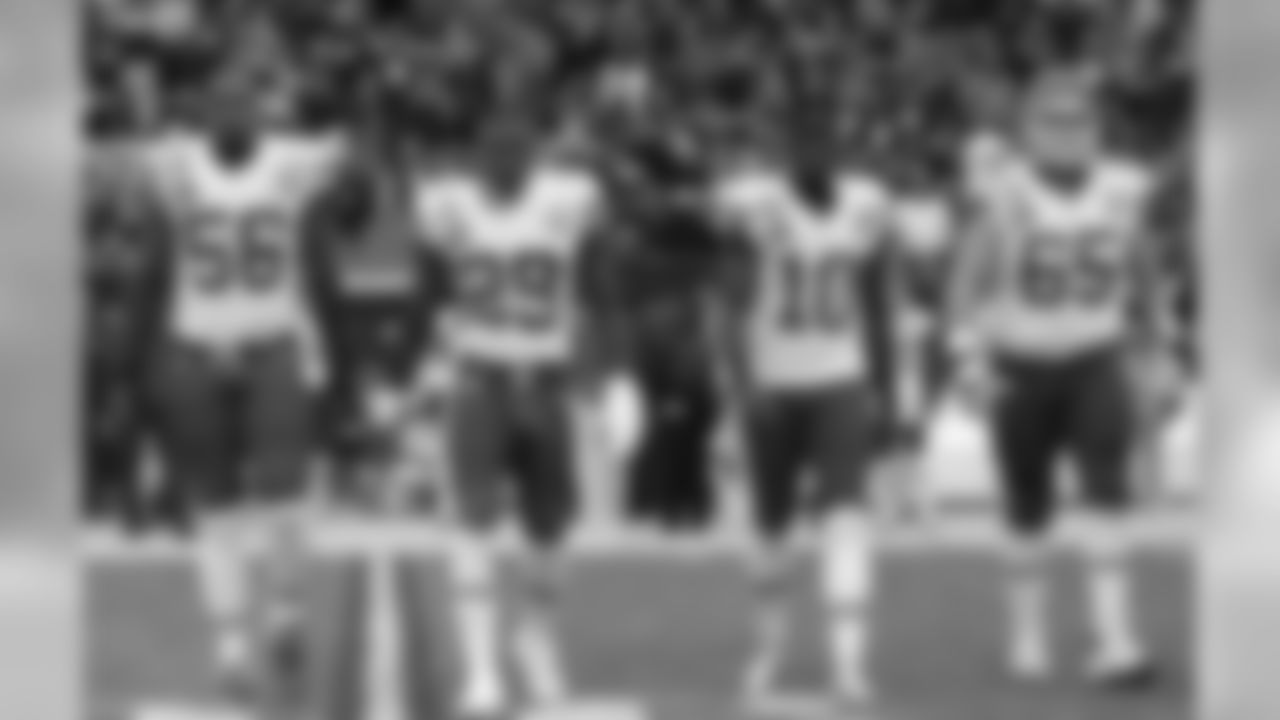 December 9, 2012. Eric Berry, Derrick Johnson, Terrance Copper, and Ryan Lilja coming out for the coin toss.