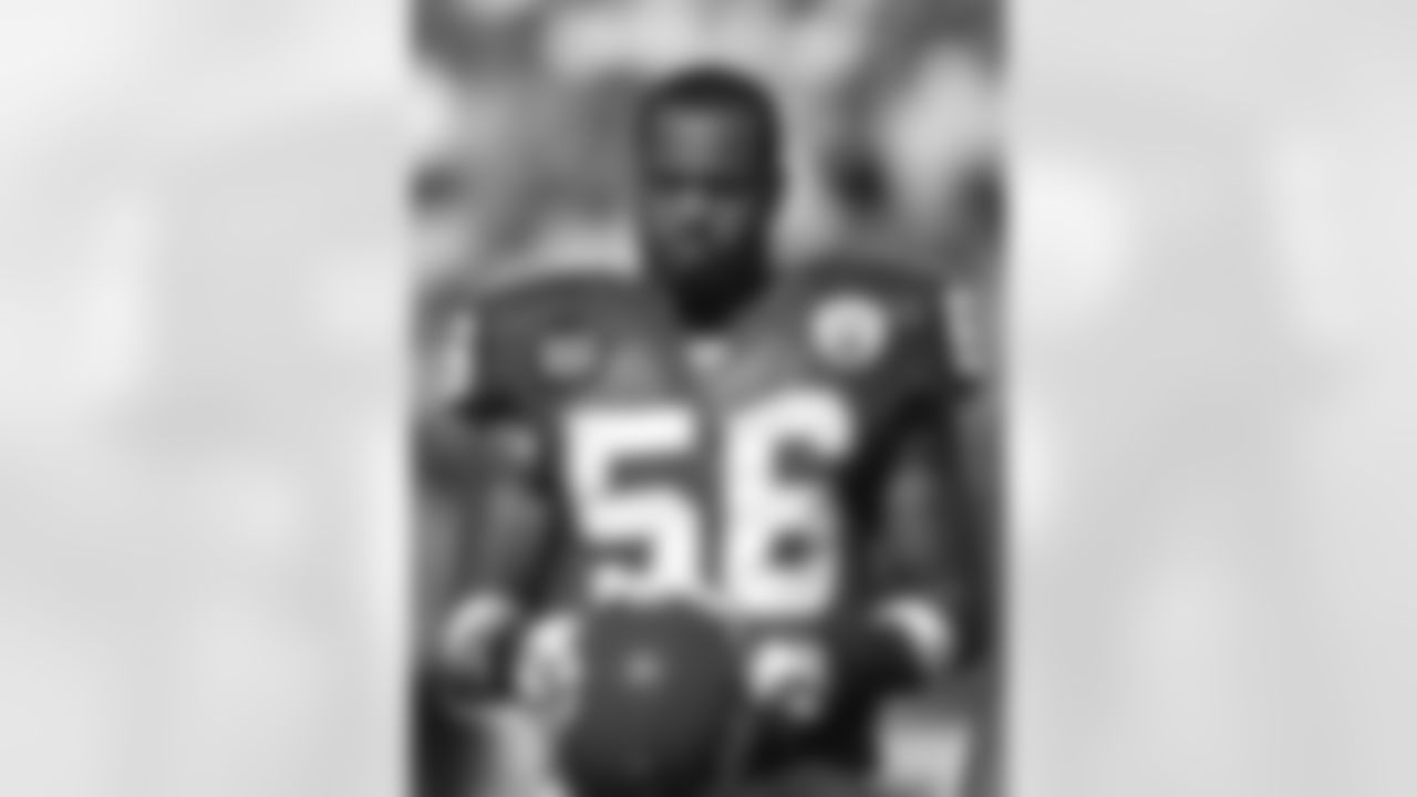 Kansas City Chiefs linebacker Derrick Johnson (56) stands on the field during the Sept. 7, 2008 away game against the New England Patriots. The Chiefs lost 10-17.