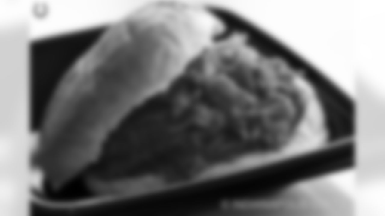 BARBECUE CHICKEN SANDWICH...slow simmered in house-made barbecue sauce served on a kaiser bun!