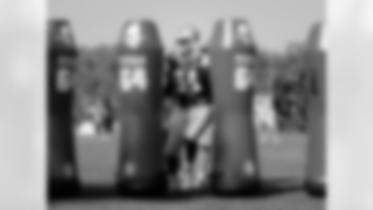 2008 - Ware makes his way through the training dummies at training camp in Oxnard, CA.