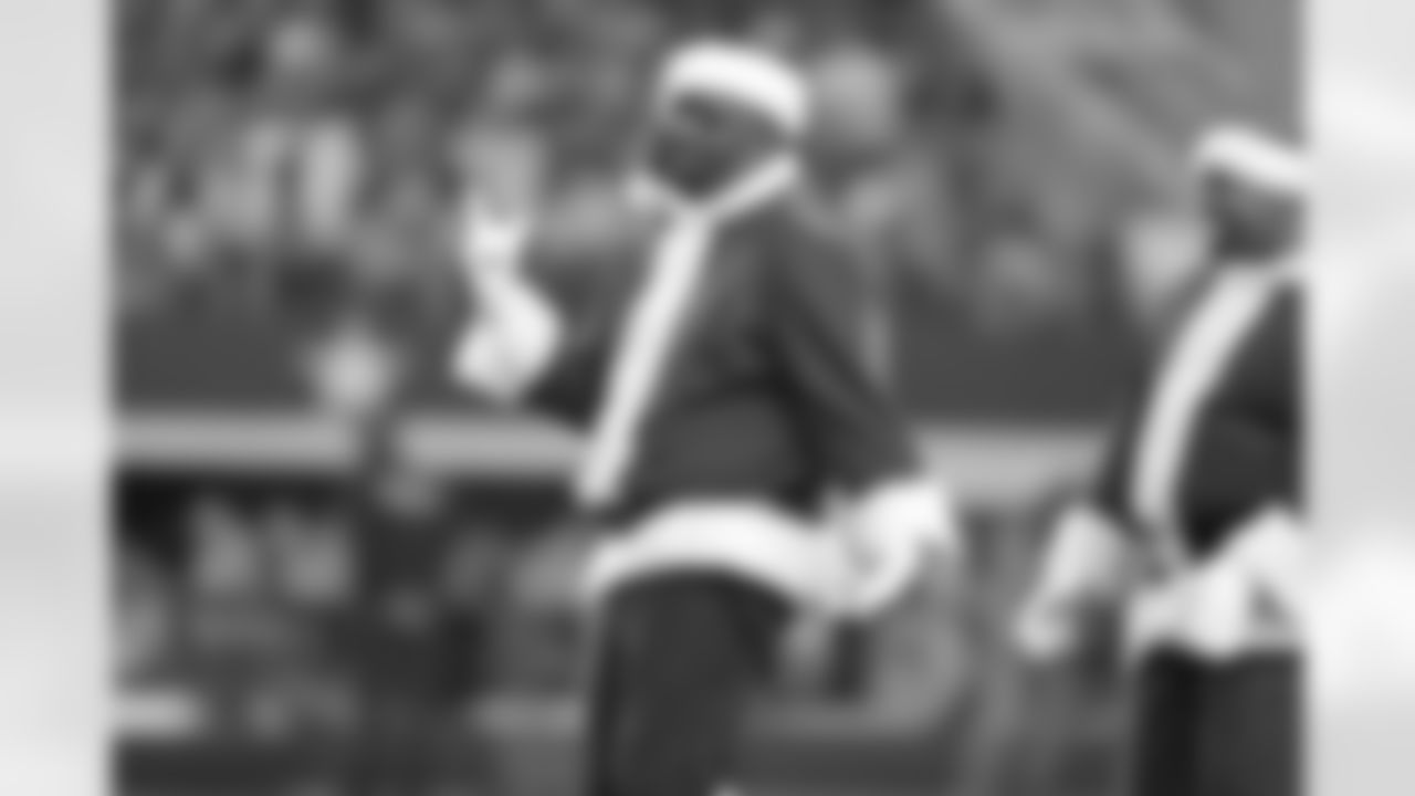 21 December 2014: Santas during cheerleaders Christmas halftime show
of the Dallas Cowboys during the Cowboys 42-7 win over the Indianapolis Colts at AT&T Stadium in Arlington, Texas. Photo by James D. Smith/Dallas Cowboys