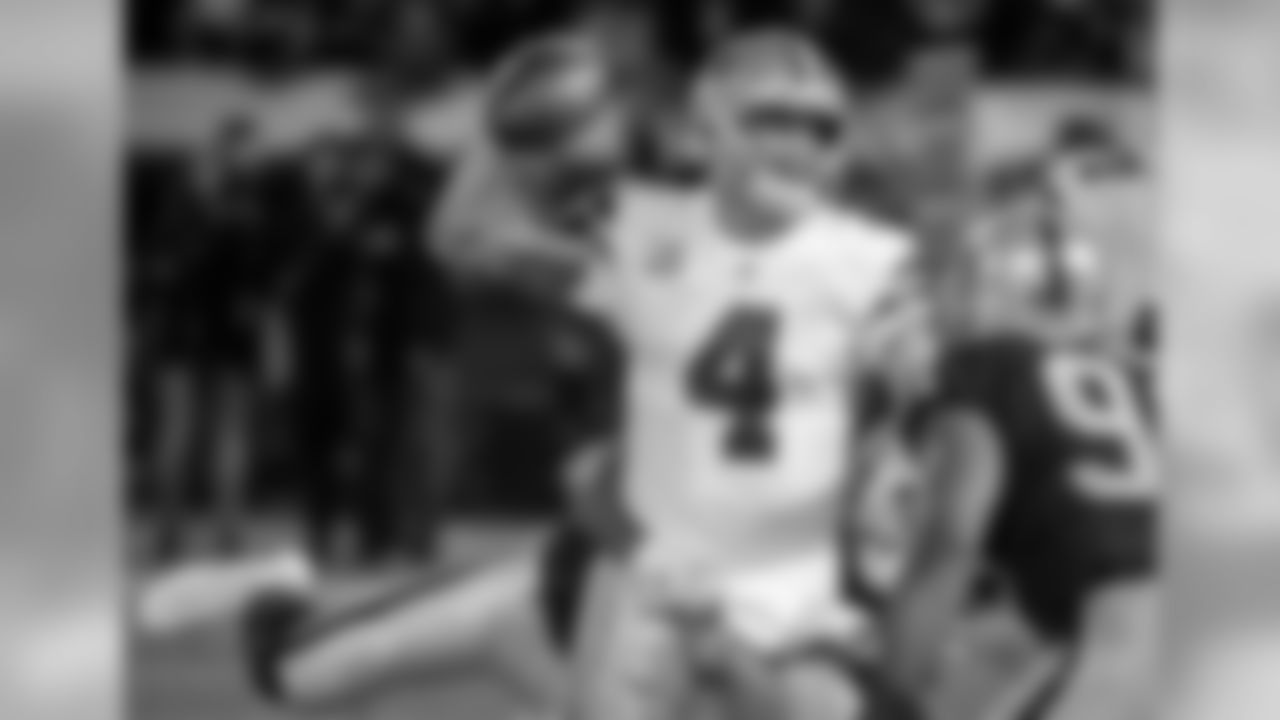 Dallas Cowboys quarterback Dak Prescott (4) passes against the Oakland Raiders during the first half of an NFL football game in Oakland, Calif., Sunday, Dec. 17, 2017. (AP Photo/Eric Risberg)