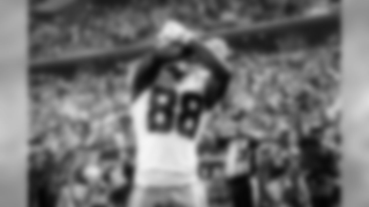 Dallas Cowboys wide receiver Dez Bryant (88) celebrates scoring against the Washington Redskins during the first half of an NFL football game, Monday, Oct. 27, 2014, in Arlington, Texas. (AP Photo/Tim Sharp)