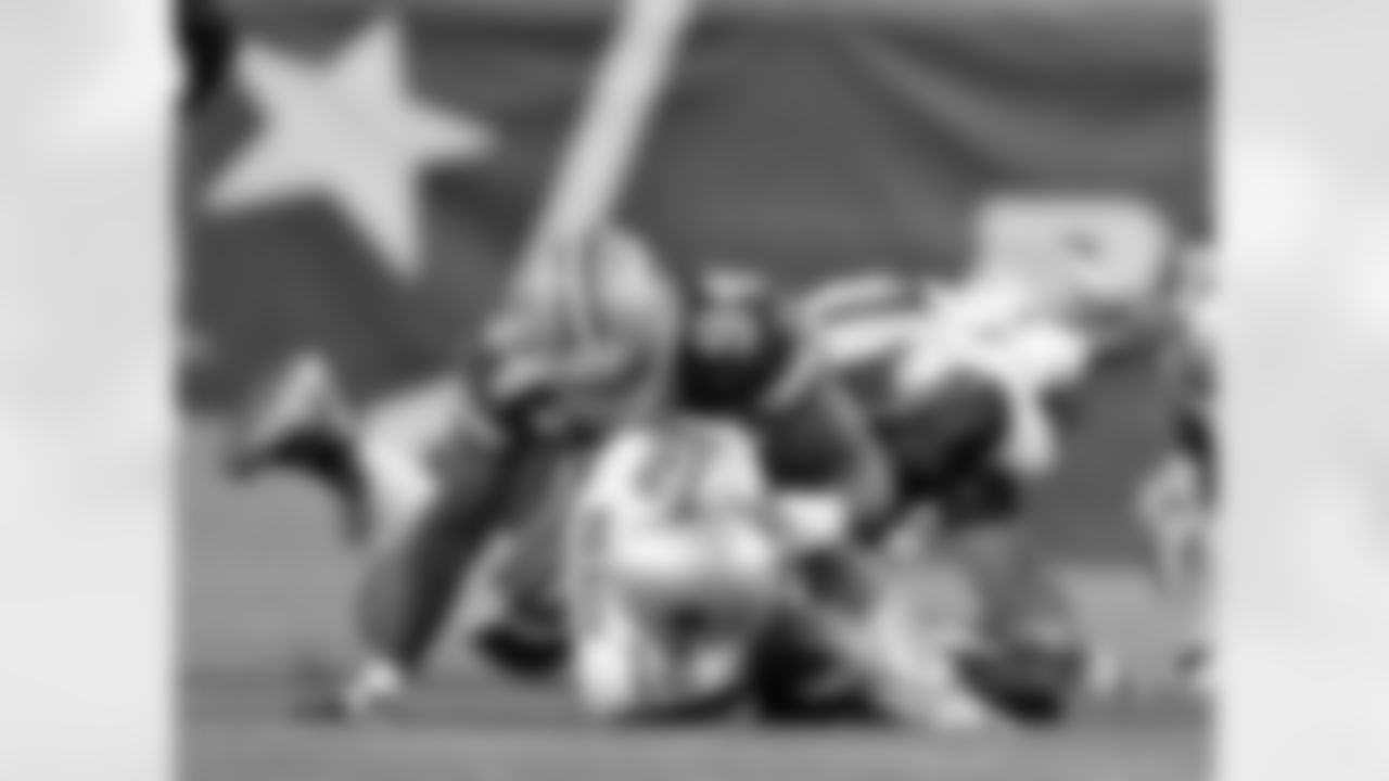 2011 - Ware has his second sack of QB Tom Brady during a Cowboys-Patriots matchup at Gillette Stadium in Foxborough, MA.