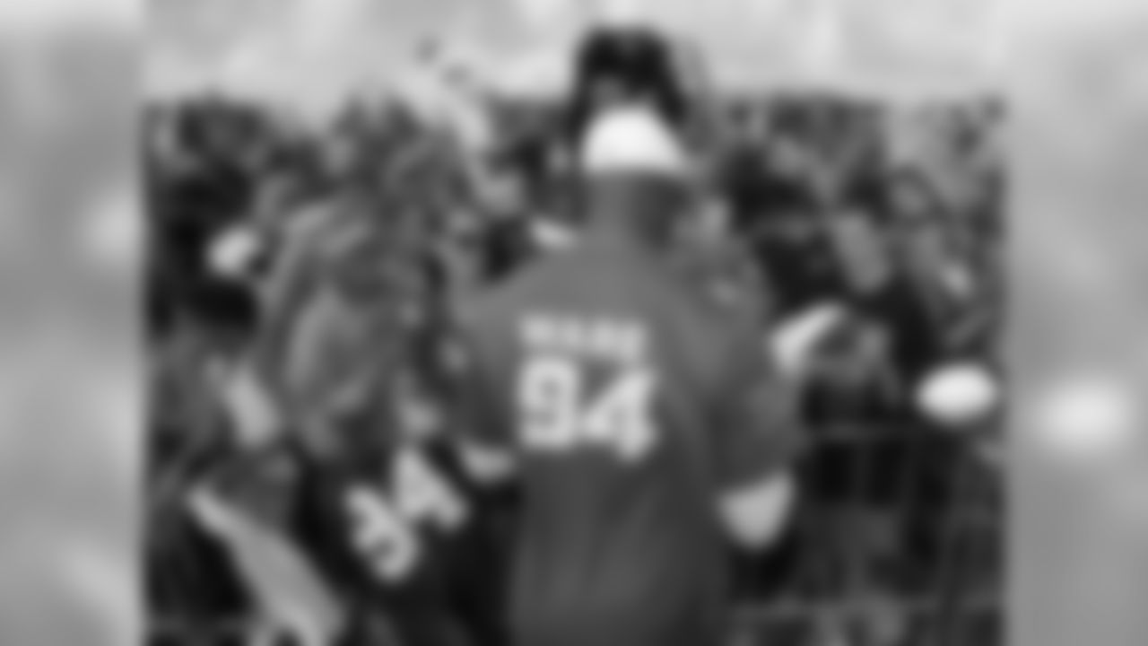 2012 - Ware signs autographs for fans after practice for the Pro Bowl in Honolulu, HI.