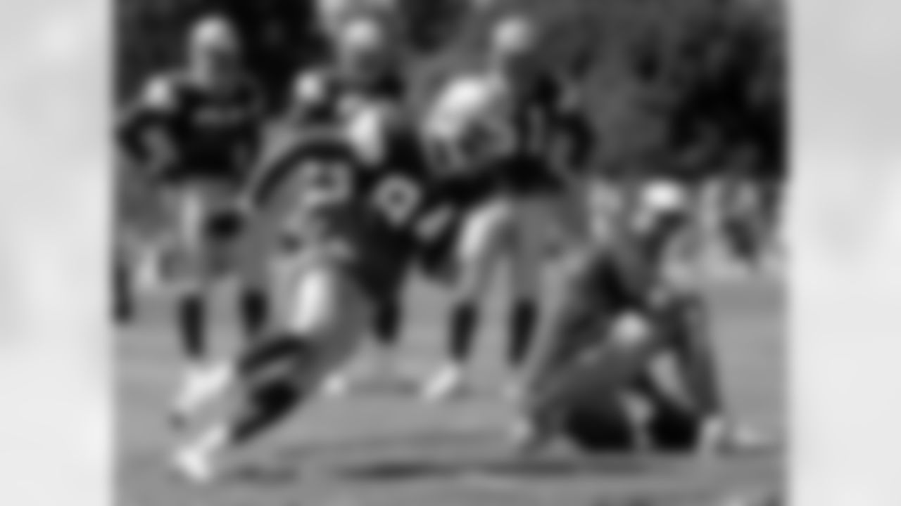 2005 - Rookie DeMarcus Ware runs drills at 2005 Cowboys Training Camp in Oxnard, CA.