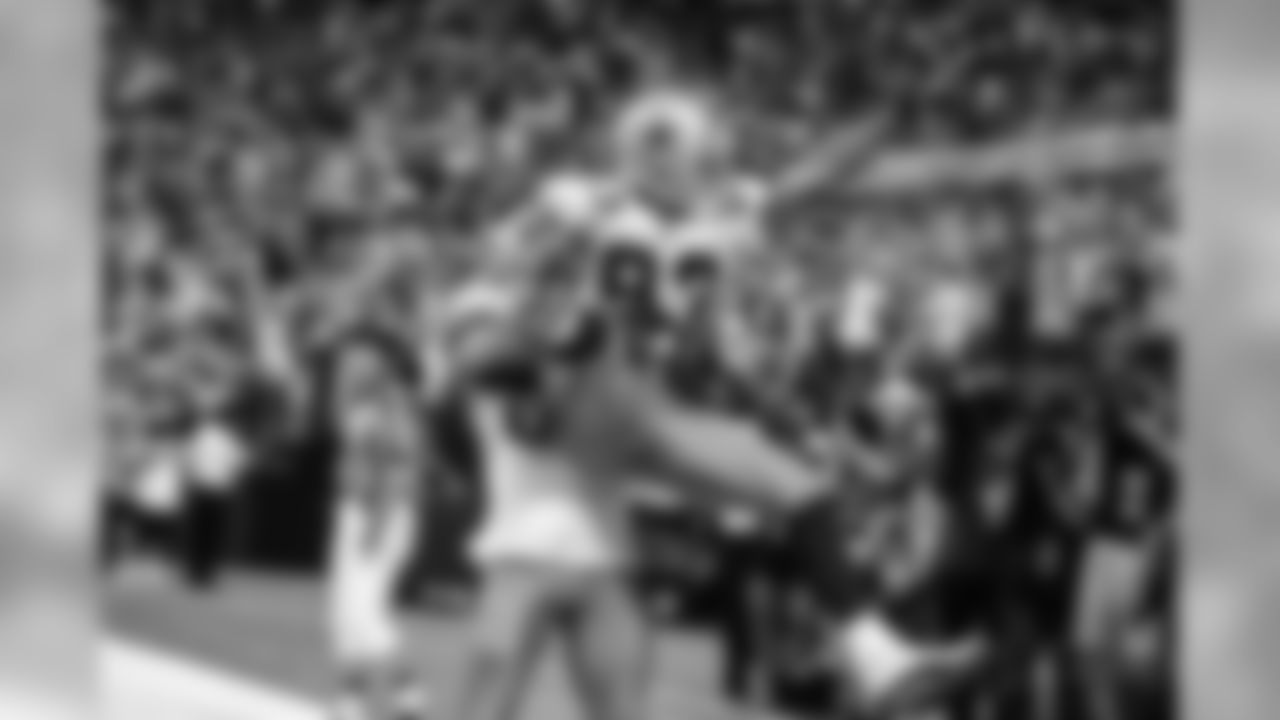 02 Nov 2003: WR Terry Glenn (83) of the Dallas Cowboys is lifted into the air by Antonio Bryant in celebration of Glenn's touchdown in the Dallas Cowboys 21-14 win over the Washington Redskins at Texas Stadium in Irving, TX.