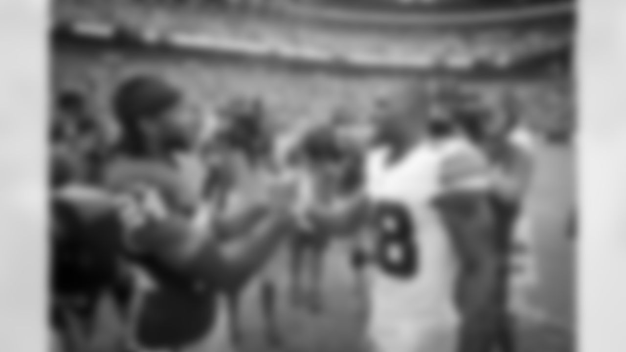 88_dez_bryant_24_josh_norman_postgame.jpg